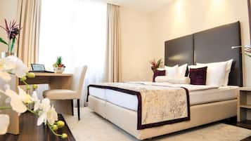 Hypo-allergenic bedding, down duvets, minibar, in-room safe