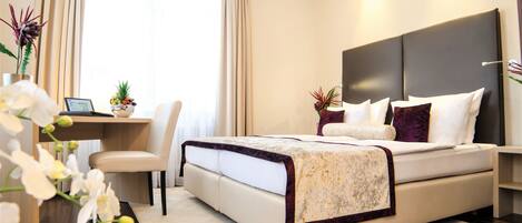 Hypo-allergenic bedding, down duvets, minibar, in-room safe