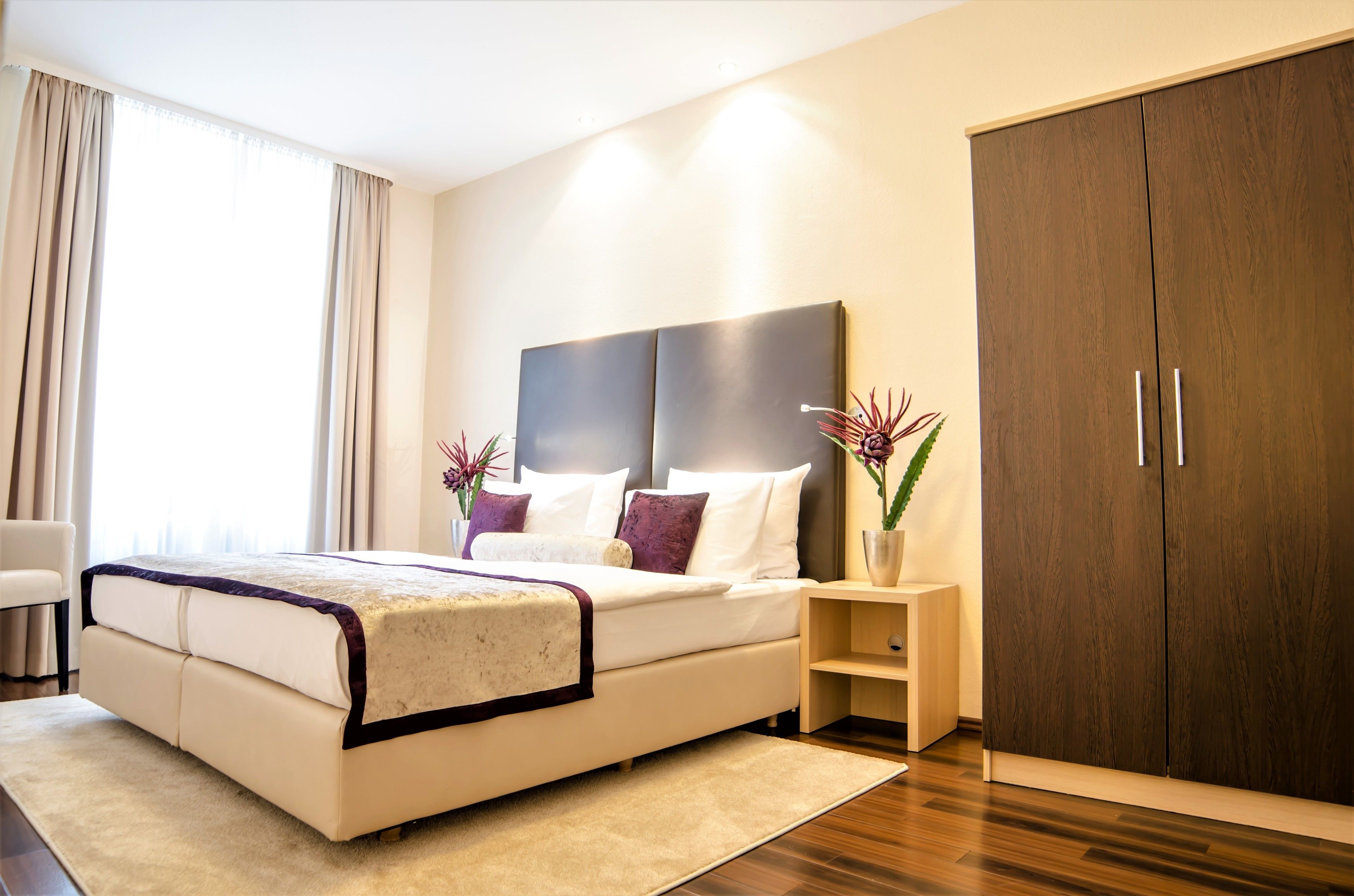 hypo-allergenic bedding, down duvets, minibar, in-room safe