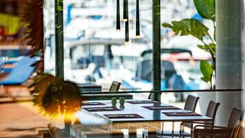 Breakfast, lunch, dinner served; Mediterranean cuisine, pool views