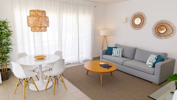 Standard Apartment, 2 Bedrooms, Pool View (3 stars, no elevator) | Living area | TV
