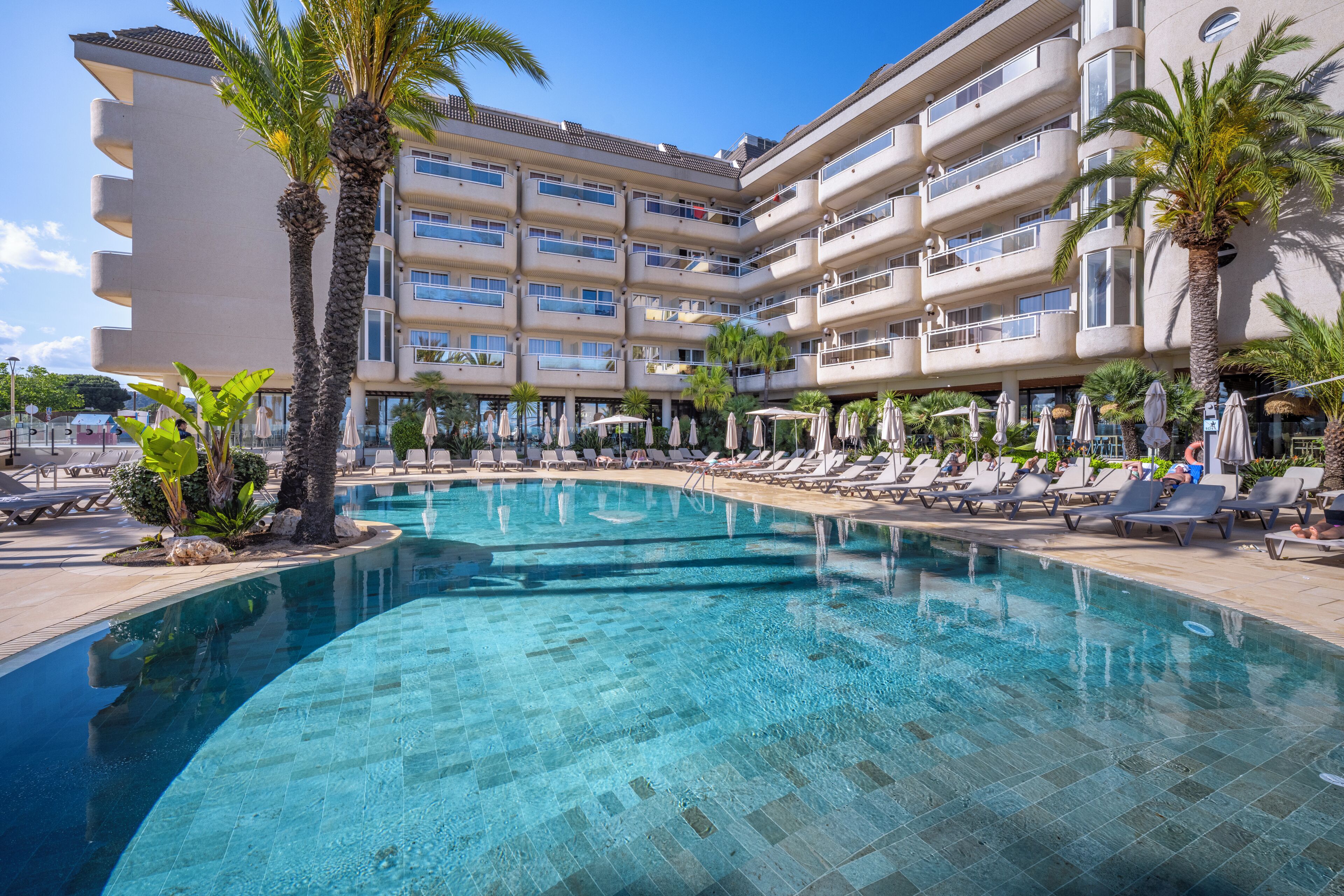 Outdoor pool, pool umbrellas, pool loungers