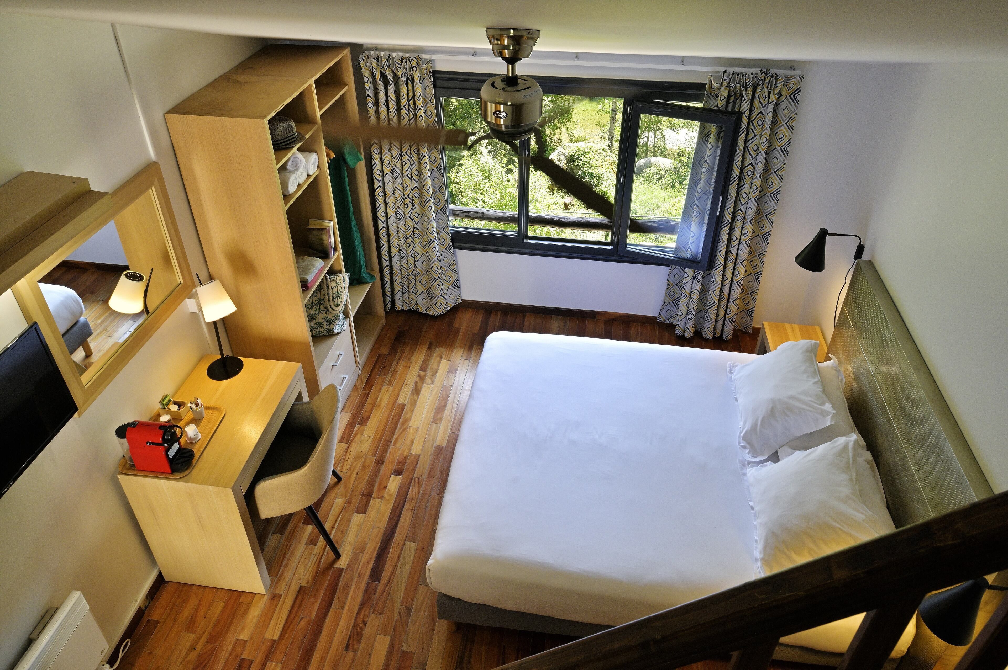 family room | 1 bedroom, desk, soundproofing, iron/ironing board