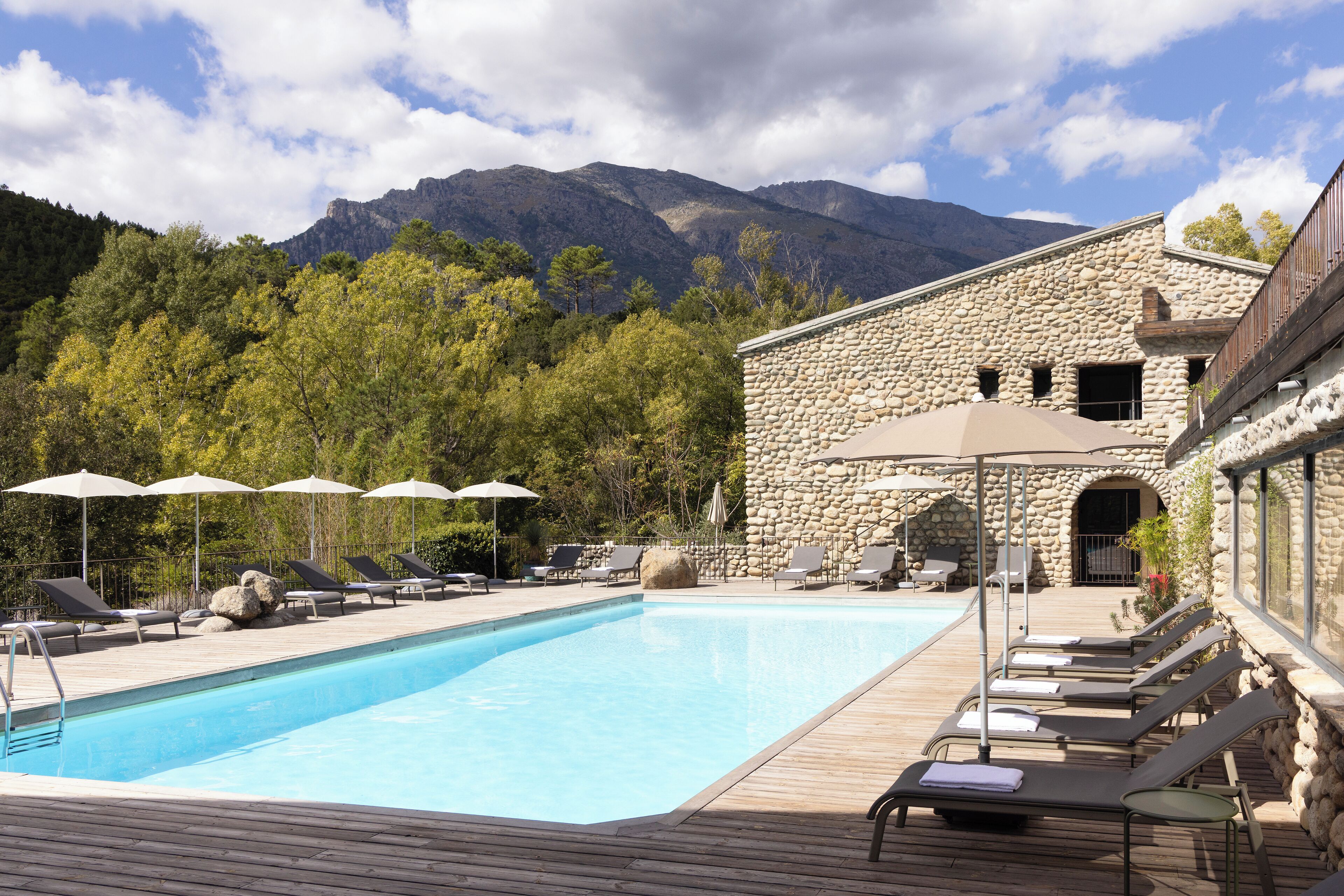 Outdoor pool, pool umbrellas, sun loungers