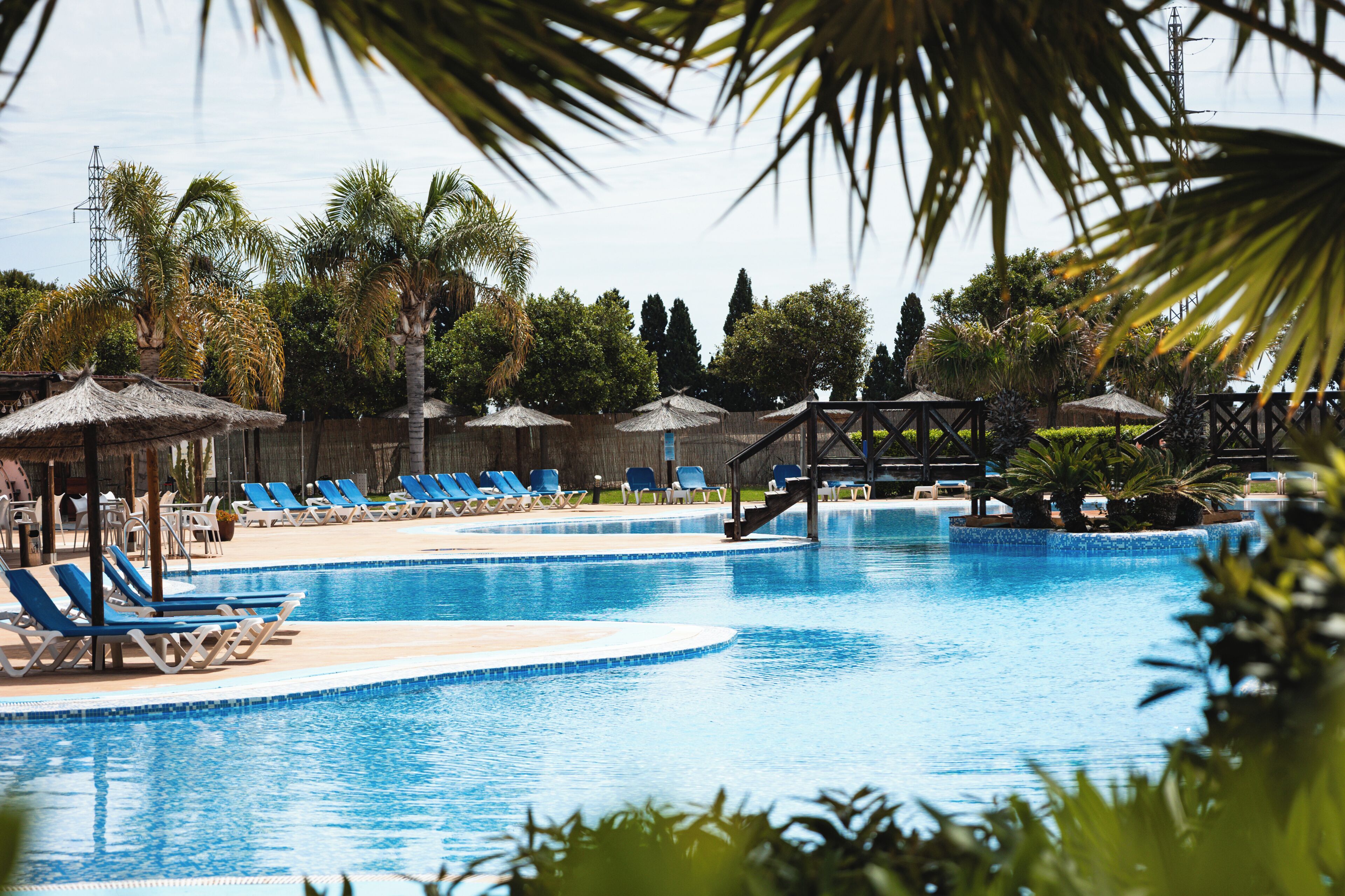 Seasonal outdoor pool, pool umbrellas, pool loungers