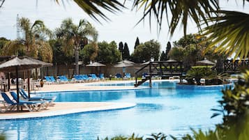 Seasonal outdoor pool, pool umbrellas, pool loungers