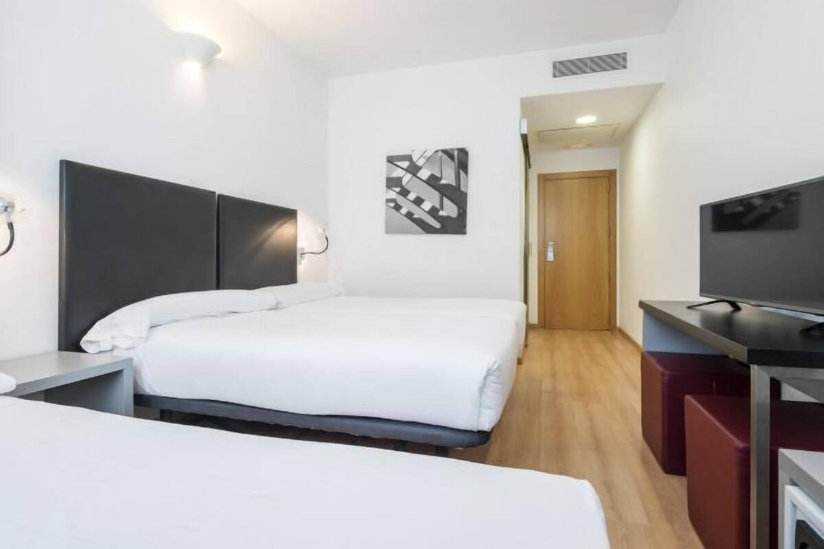 Couette en duvet d'oie, coffres-forts dans les chambres, bureau