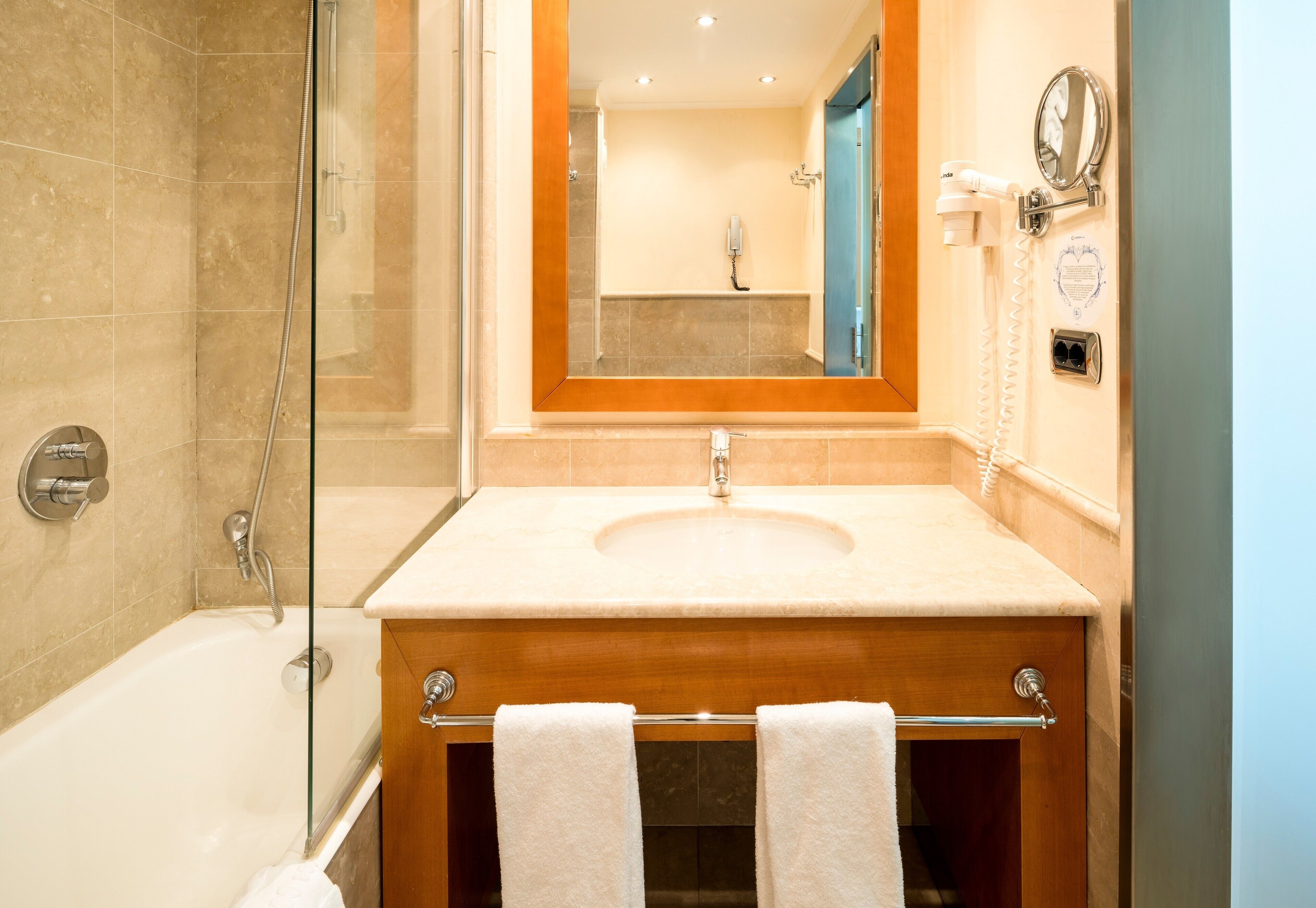 combined shower/bathtub, deep-soaking bathtub, eco-friendly toiletries