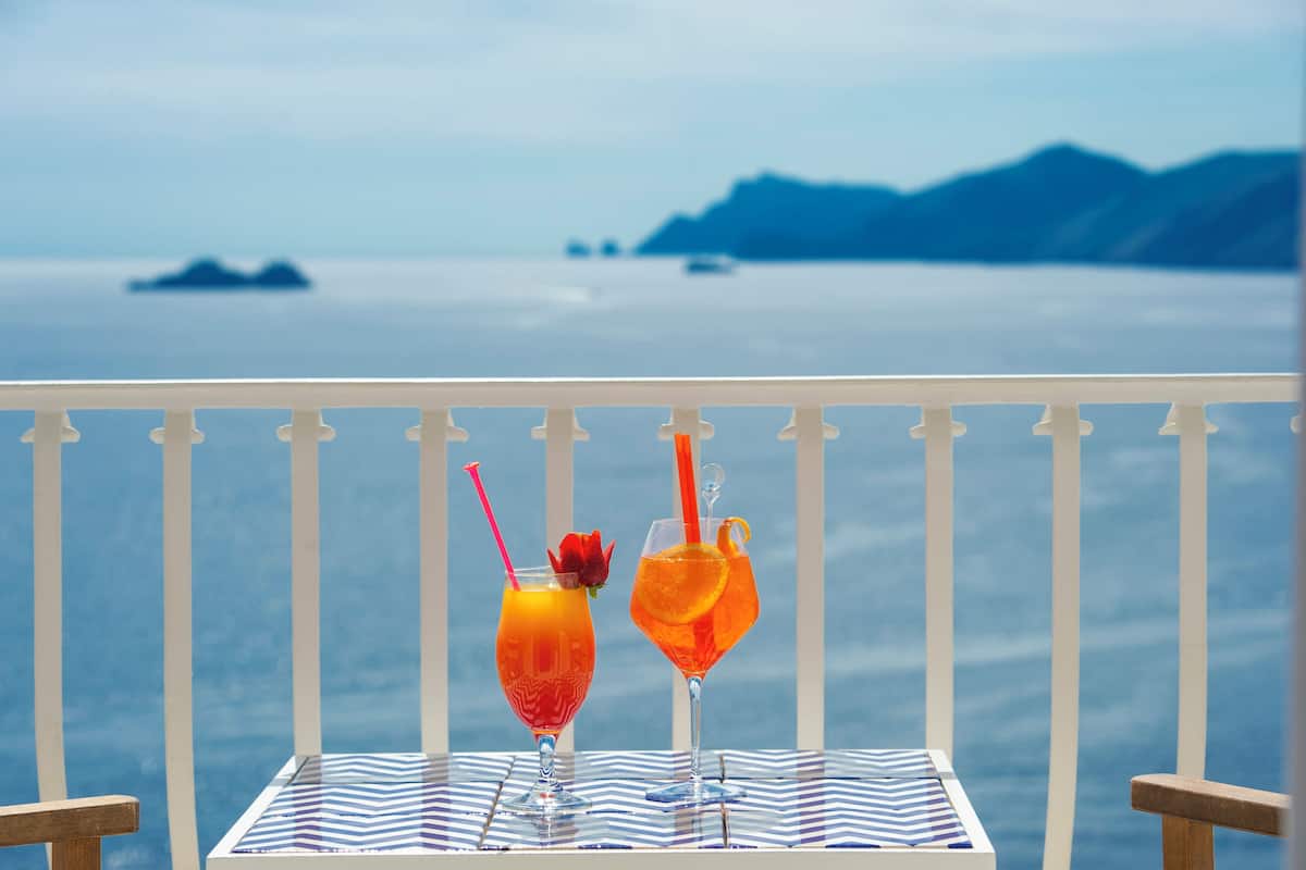 Junior Double Room, Balcony, Sea View | Down comforters, minibar, in-room safe, individually furnished