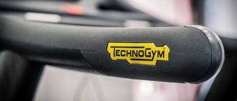 A steering wheel with a visible logo.