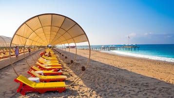 Private beach, sun loungers, beach umbrellas, beach towels