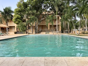 Outdoor pool, a rooftop pool, open 7 AM to 9 PM, sun loungers