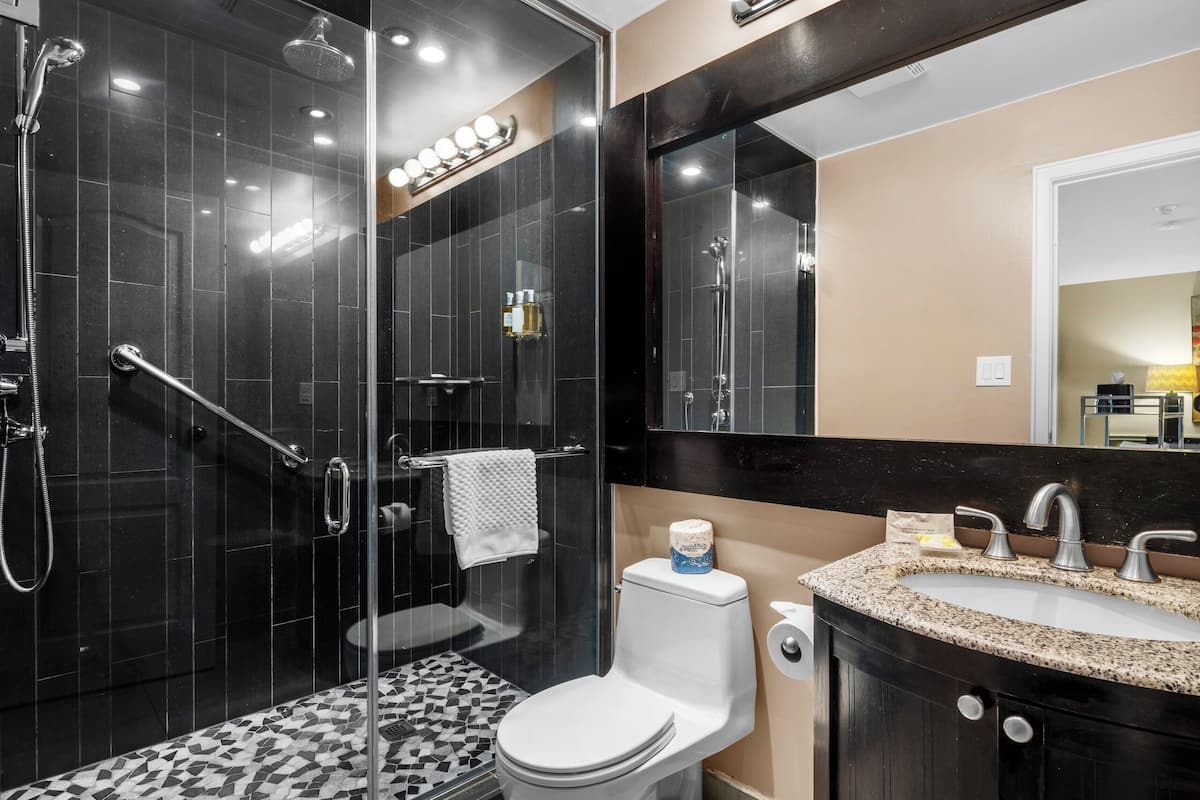 club room (located on second floor, stair access only) | bathroom | rainfall showerhead, designer toiletries, hair dryer, bathrobes