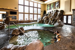 Indoor pool, outdoor pool, pool umbrellas, sun loungers
