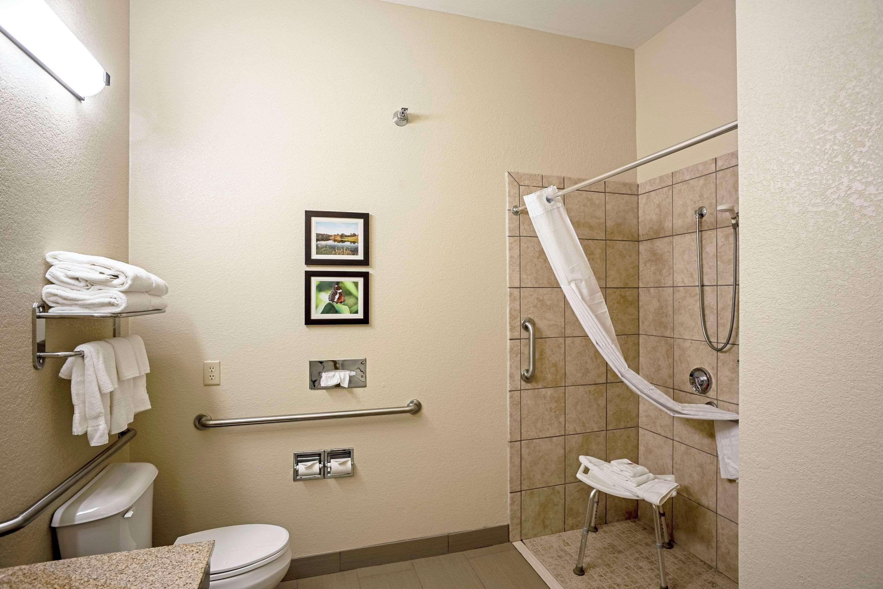 premium bedding, desk, laptop workspace, blackout curtains