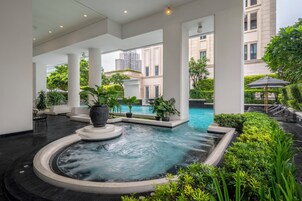 Outdoor pool, pool umbrellas, sun loungers