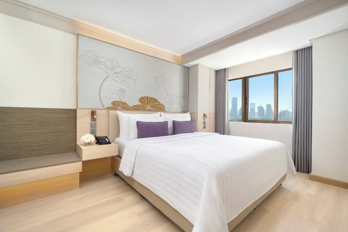 One Bedroom Balcony Junior Suite | 房內夾萬、熨斗/熨衫板、免費 Wi-Fi、床單