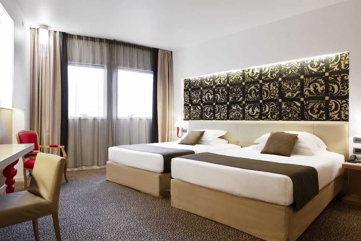 superior quadruple room | premium bedding, down duvets, minibar, in-room safe