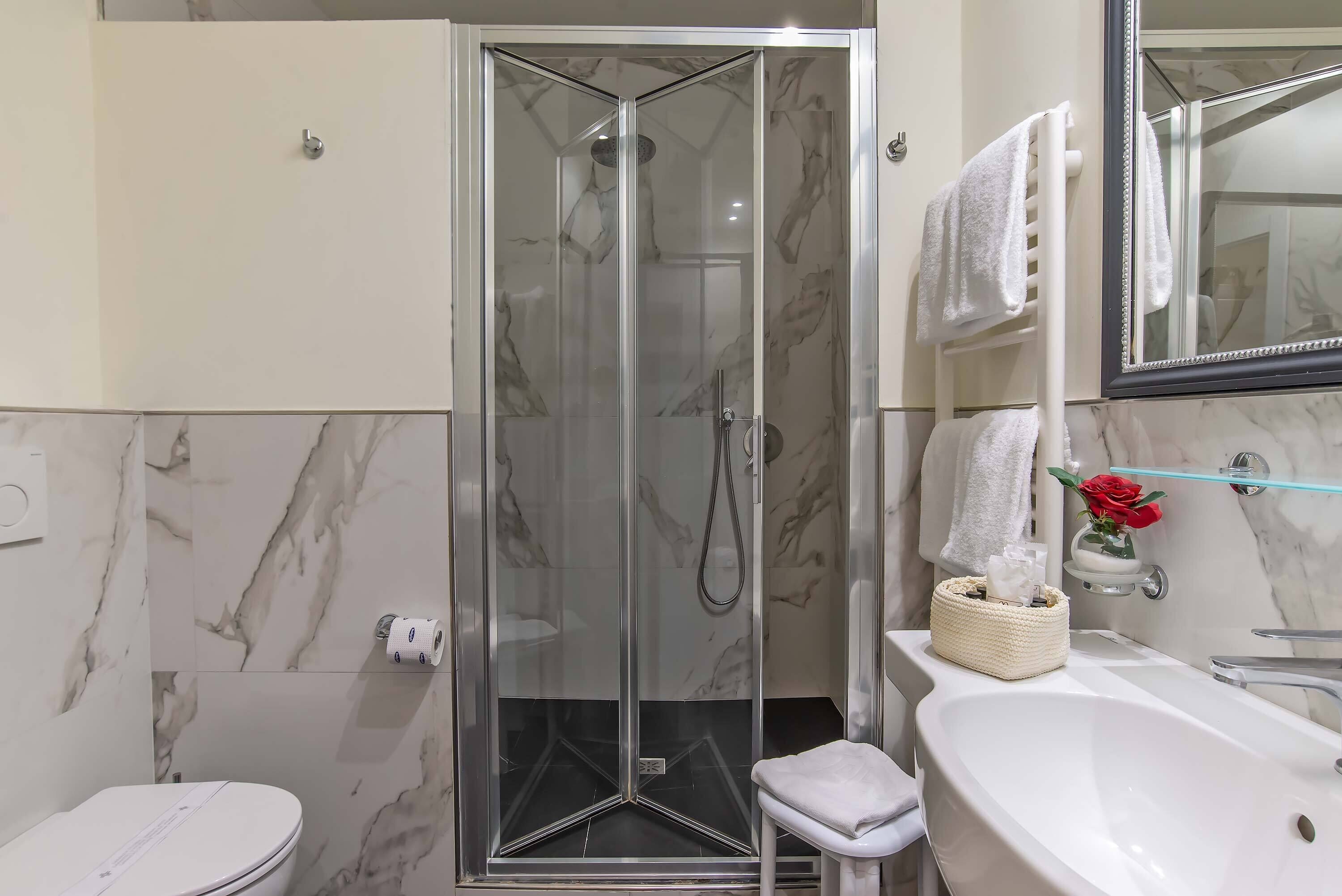 triple room | bathroom | shower, hair dryer, bidet, towels
