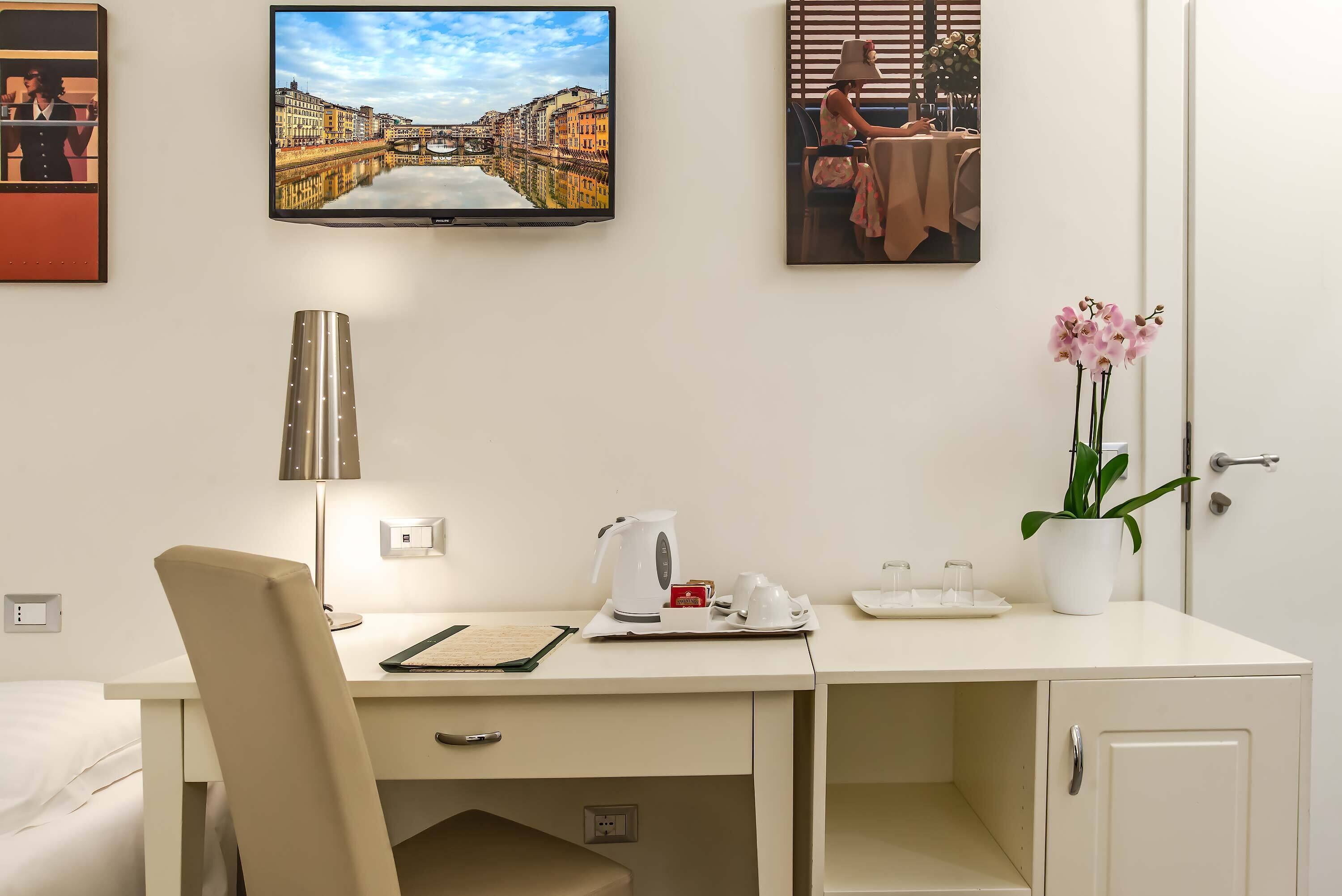 quadruple room | minibar, in-room safe, desk, blackout curtains