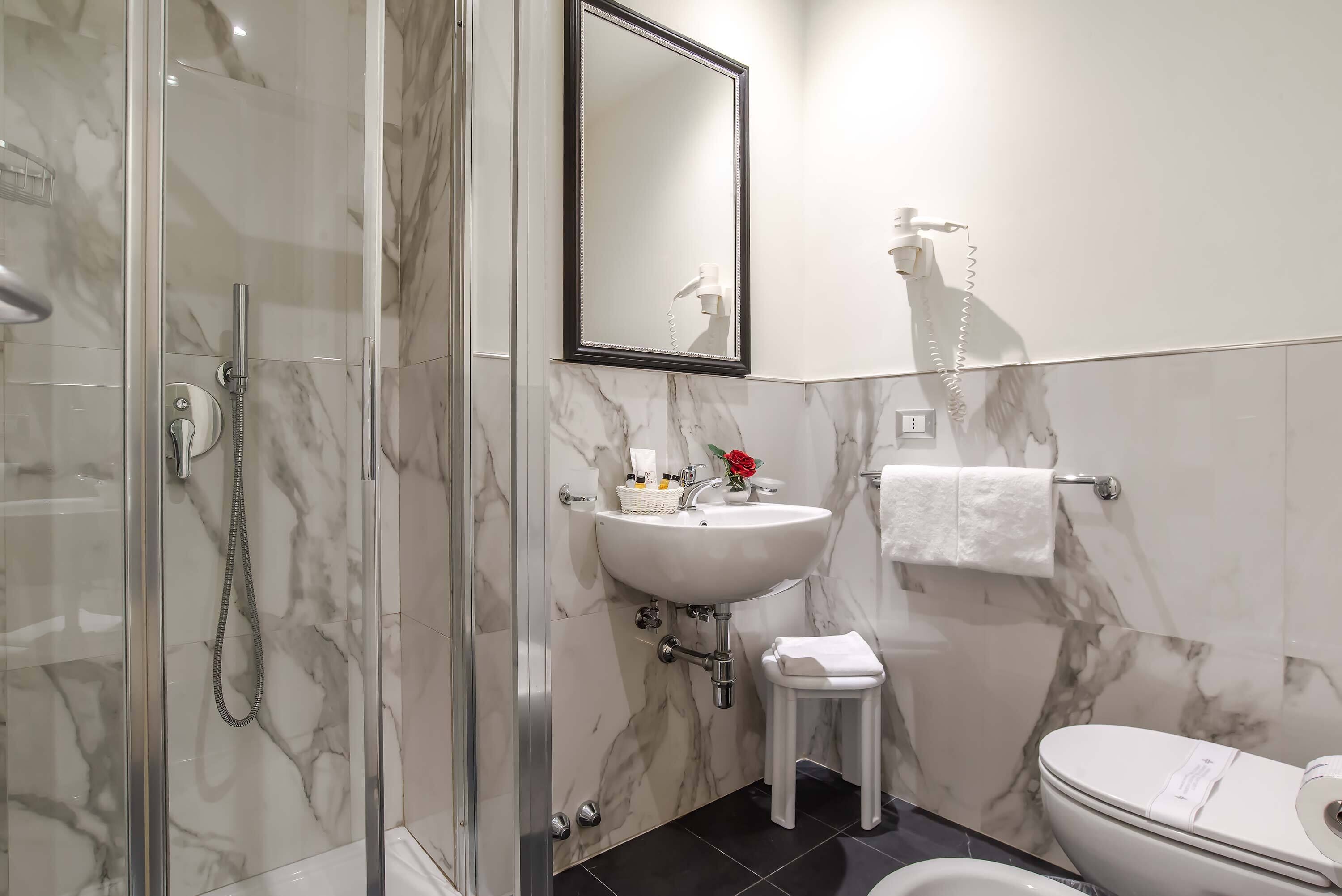 double room | bathroom | shower, hair dryer, bidet, towels