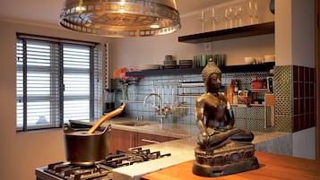 Deluxe Penthouse, 2 Bedrooms | Private kitchen | Fridge, coffee/tea maker, cookware/dishes/utensils