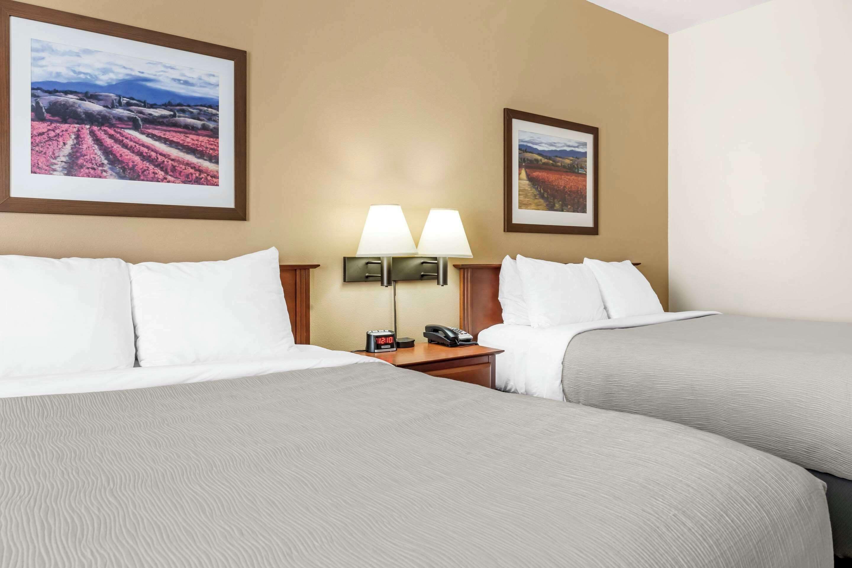 pillow-top beds, blackout curtains, iron/ironing board