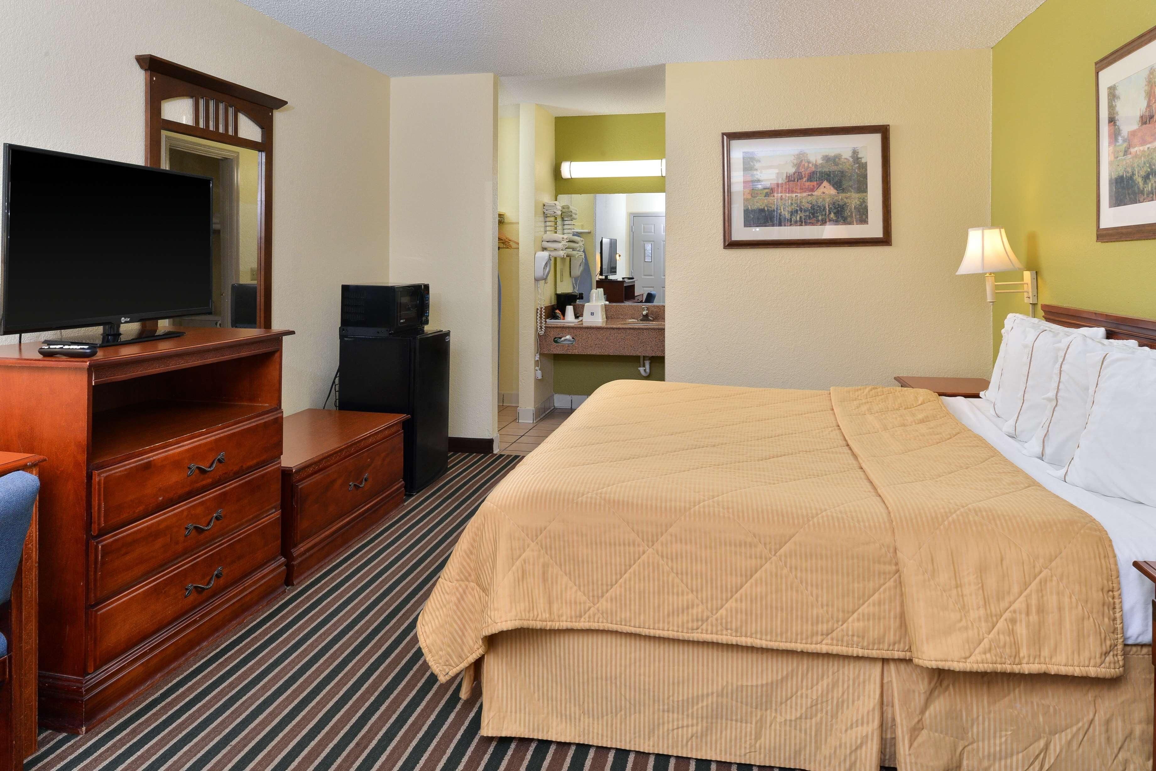 Desk, blackout drapes, iron/ironing board, cribs (surcharge)