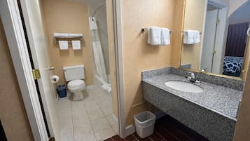 Combined shower/bathtub, hair dryer, towels, soap