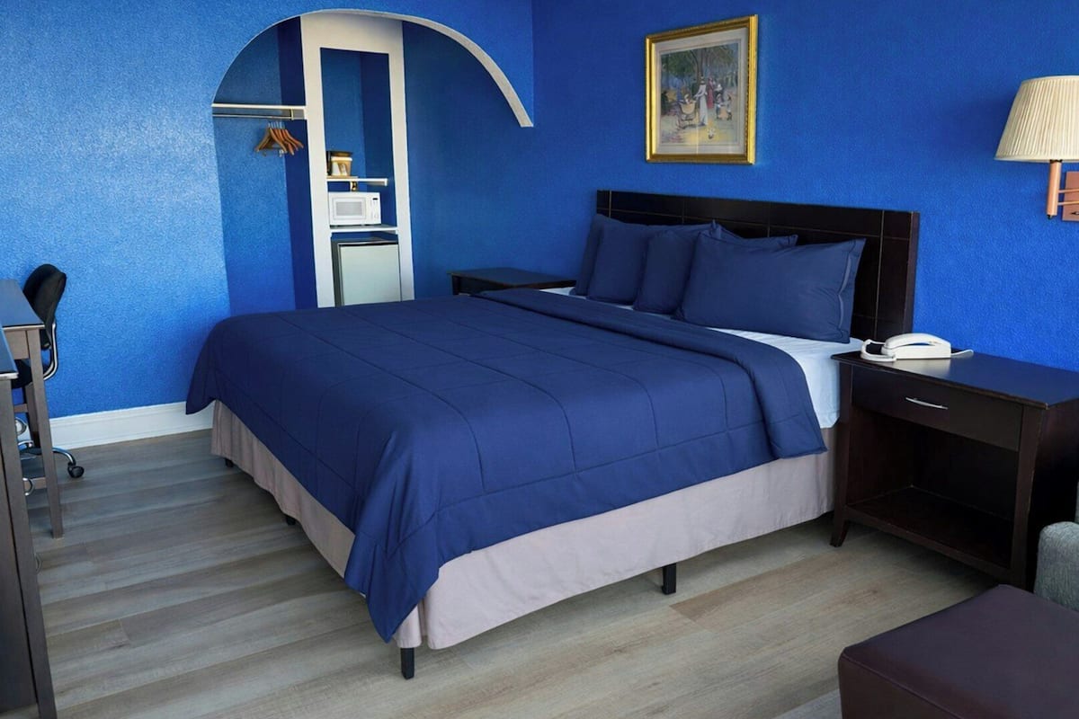 Premium bedding, down comforters, desk, iron/ironing board