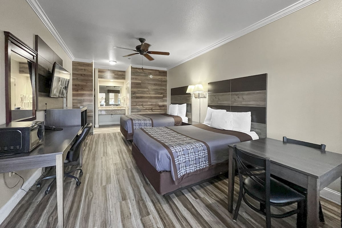 Deluxe Room, 2 Queen Beds | Desk, laptop workspace, iron/ironing board, free WiFi