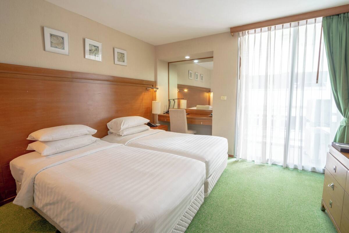 In-room safe, desk, blackout curtains, iron/ironing board (on request)