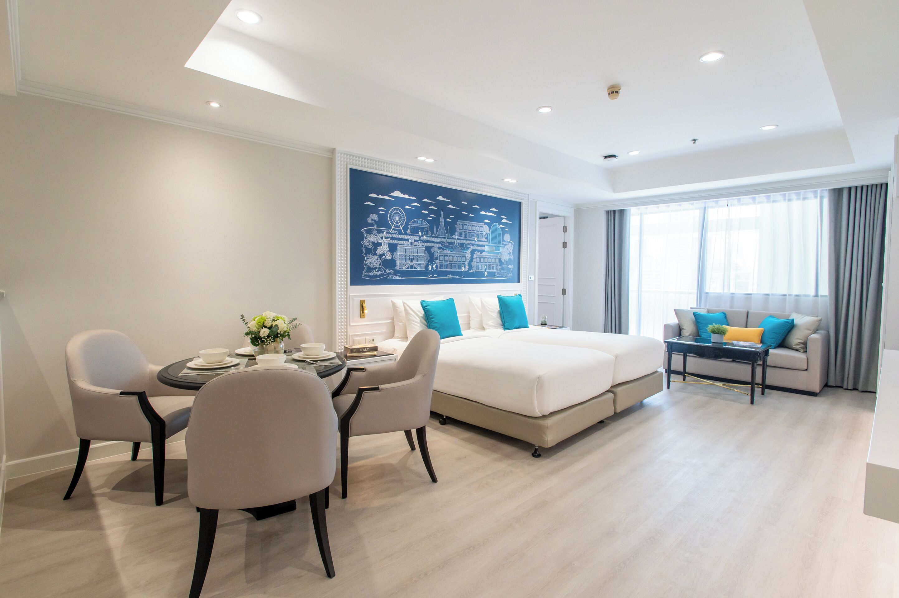 family suite for 4 persons  | living area | 55-inch smart tv with cable channels