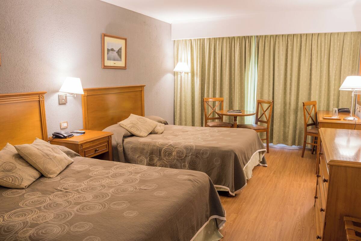 Classic Twin Room | Minibar, blackout drapes, iron/ironing board, WiFi (free)