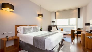 Luxe beddengoed, bedden met traagschuimmatras, een minibar