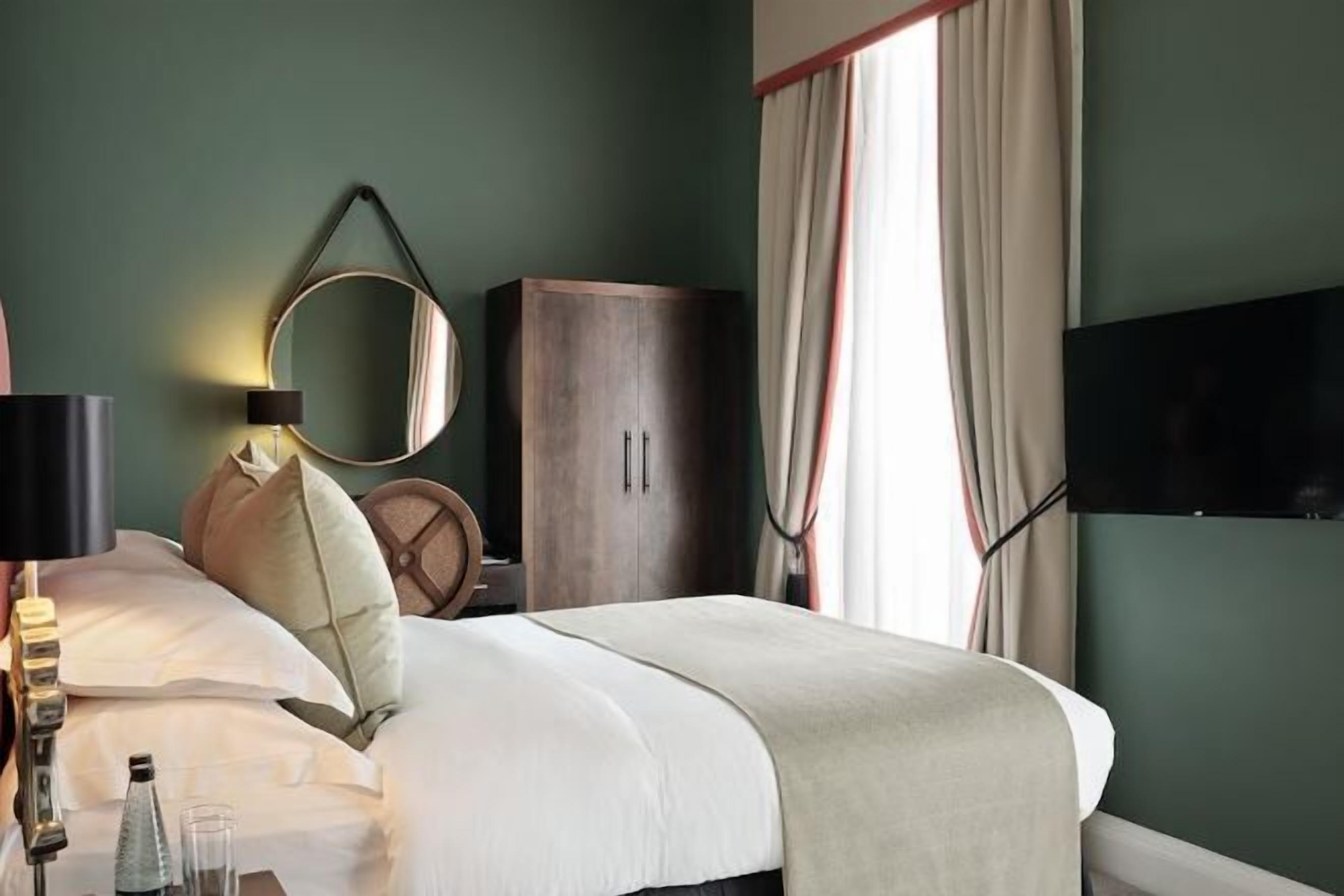 Premium bedding, down duvets, pillow-top beds, in-room safe