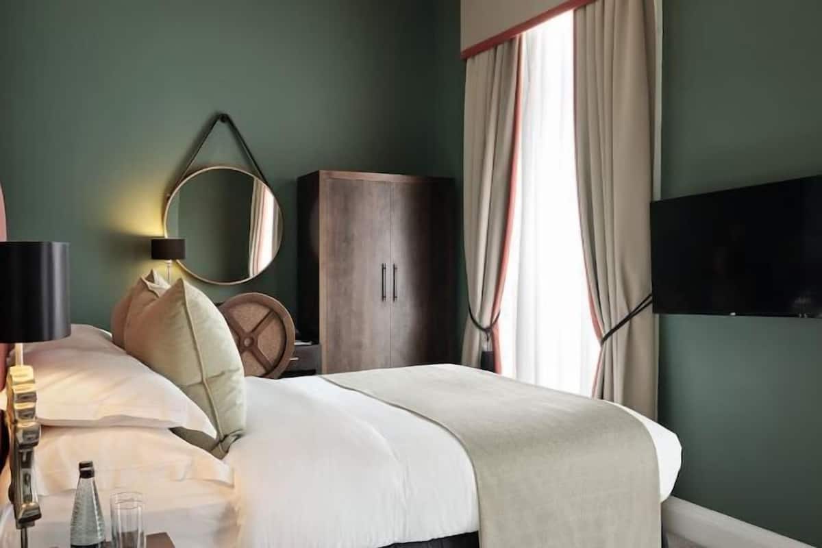 Premium bedding, down duvets, pillow-top beds, in-room safe