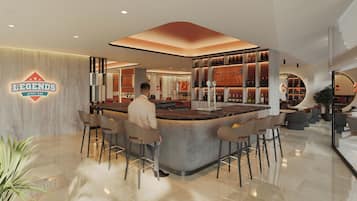 A modern bar area with a central island, bar stools, and a visible sign reading "LEGENDS SPORT BAR".