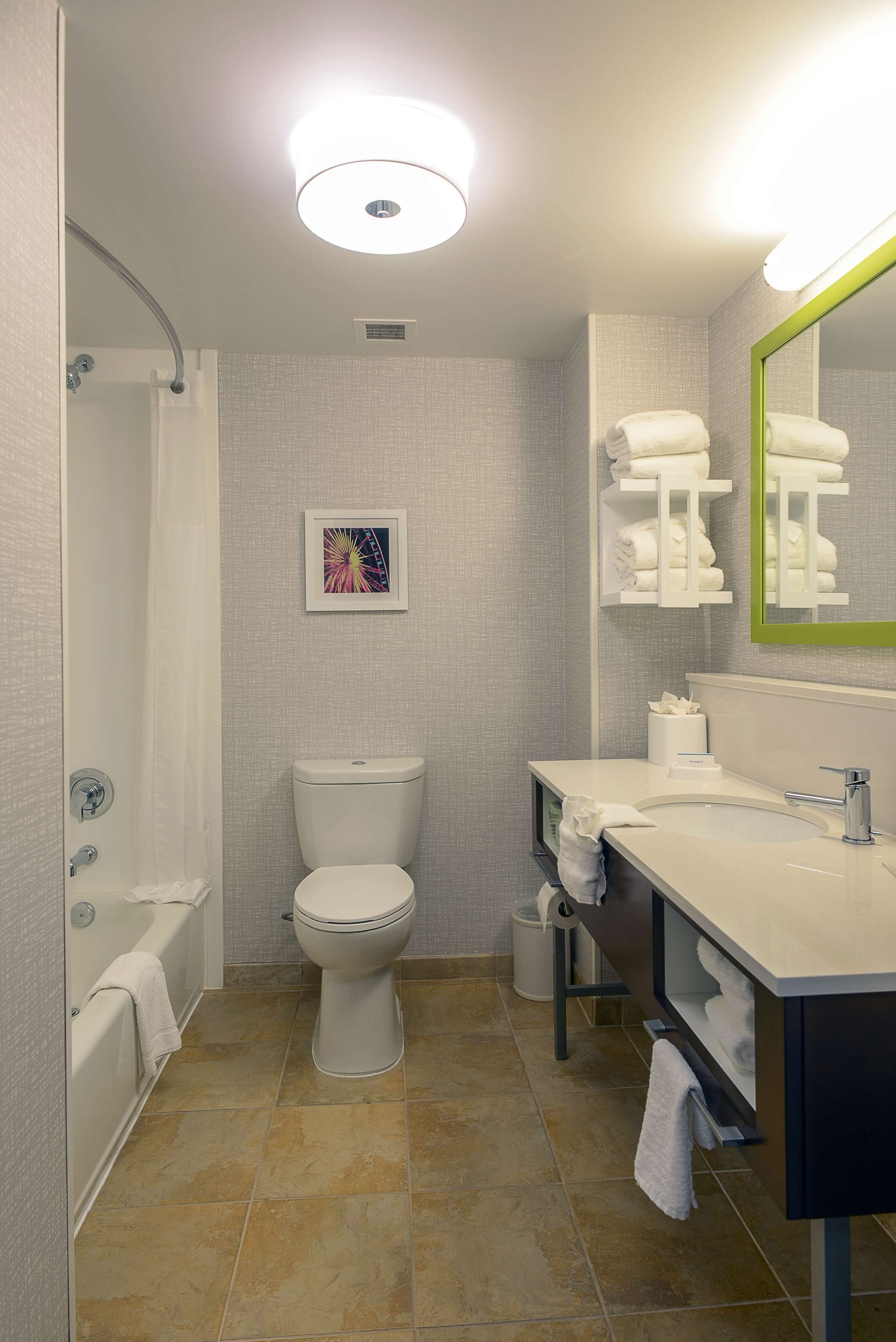 room, 2 queen beds | bathroom | free toiletries, hair dryer, towels