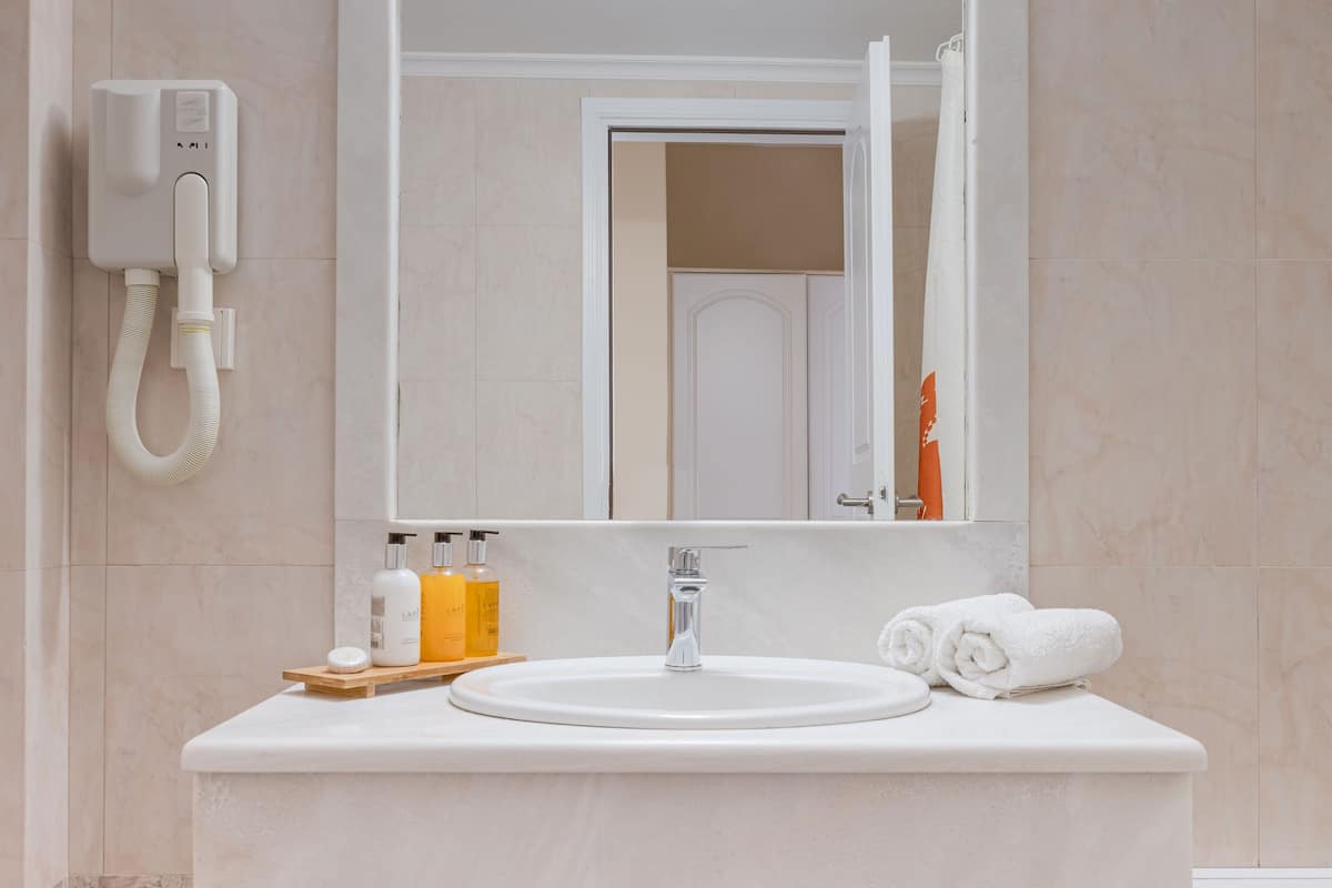 superior room | bathroom | hair dryer, towels