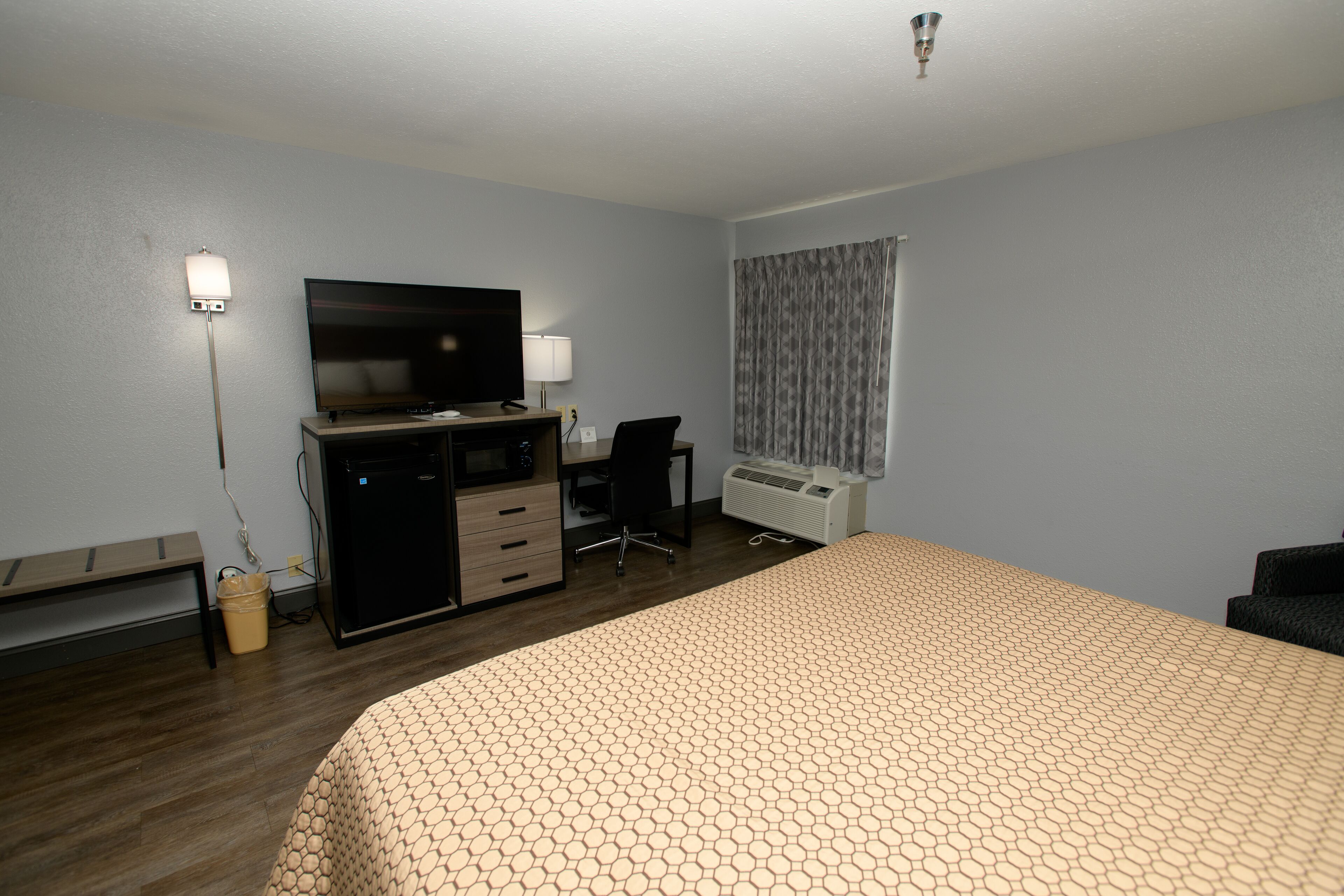 comfort room, 1 bedroom | premium bedding, desk, blackout curtains, iron/ironing board