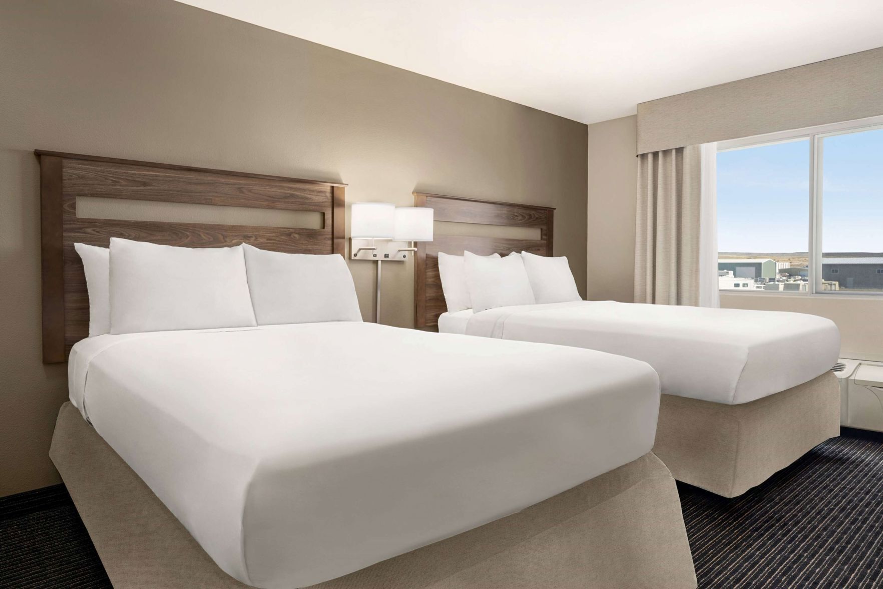 Desk, blackout drapes, iron/ironing board, free cribs/infant beds