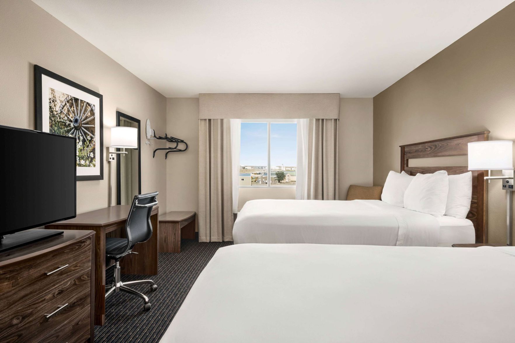 Desk, blackout drapes, iron/ironing board, free cribs/infant beds