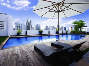 Outdoor pool, open 6 AM to 10 PM, sun loungers