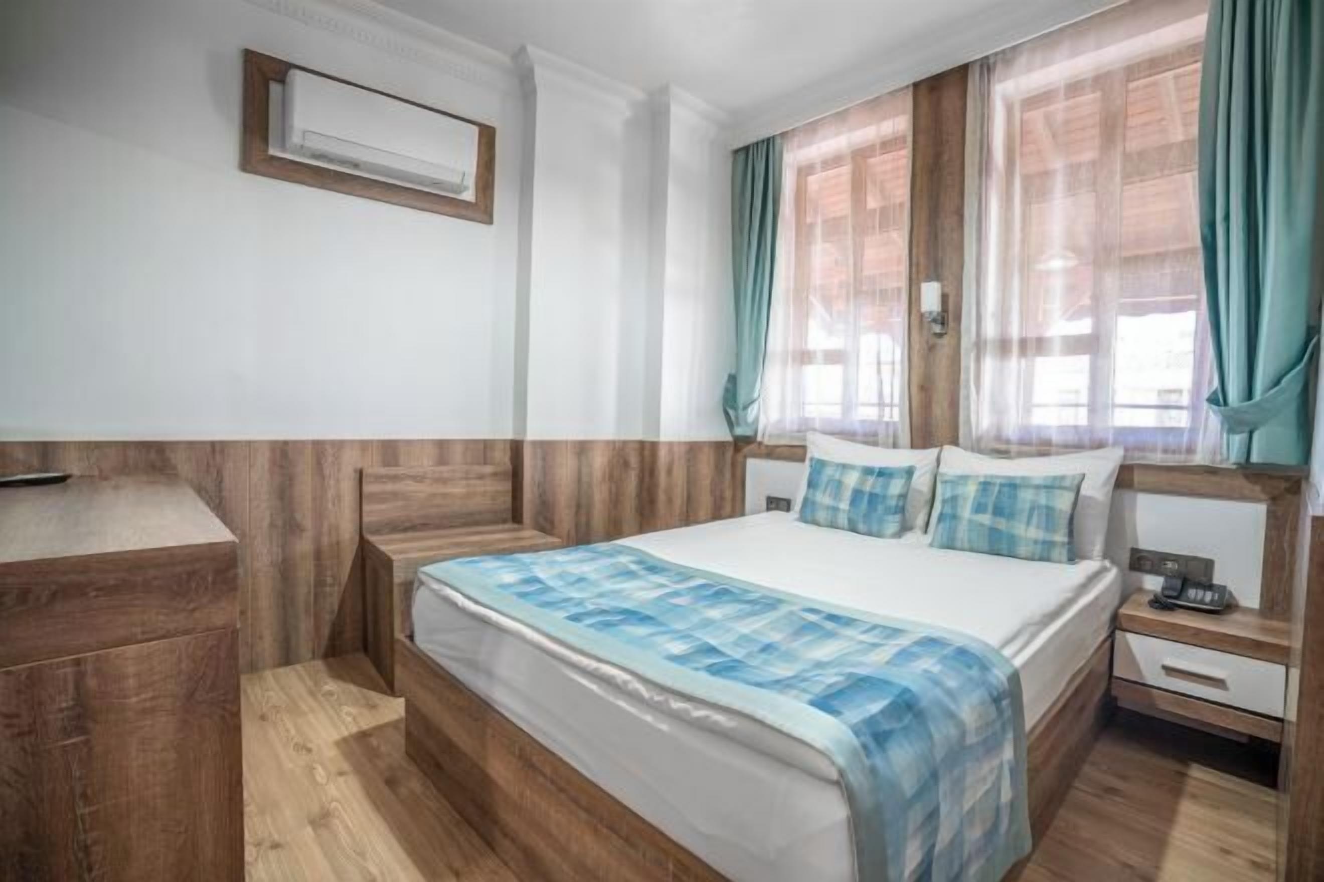 1 bilik tidur, peralatan tempat tidur premium, bar mini, kalis bunyi 