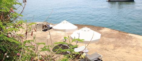 Private beach, sun loungers, beach umbrellas, beach volleyball