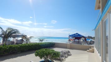 On the beach, white sand, beach towels
