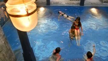 Outdoor pool, open 8:00 AM to 6:00 PM, pool loungers