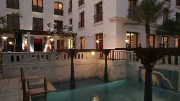 Outdoor pool, open 8:00 AM to 6:00 PM, sun loungers