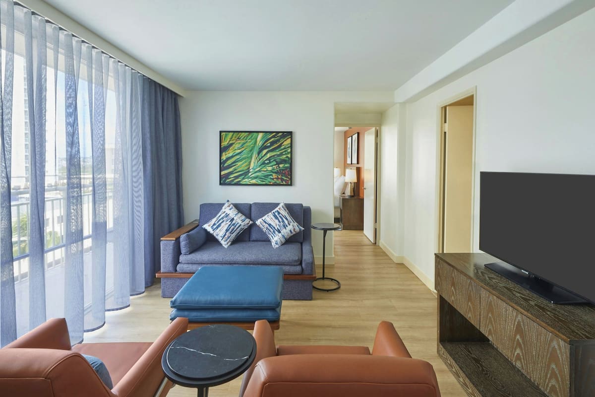 Suite, 1 Bedroom, Non Smoking, Balcony (Corner) | Living room | 42-inch flat-screen TV with cable channels, TV